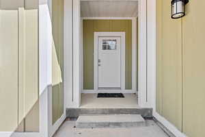 Welcome to your covered  front  entry featuring a Therma-Tru insulated door
