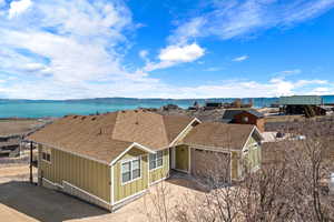 Exterior featuring the garage and entrance, home sits on .28 acres with 3,982 sq ft