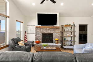 Great  room featuring a gas fireplace and knotty alder mantel