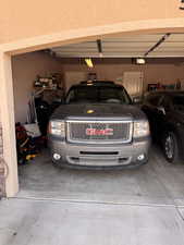 Garage featuring a garage door opener