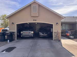 Garage with concrete driveway