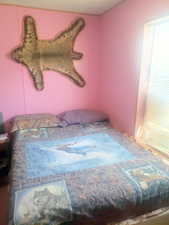View of 1 of 3 bedrooms.