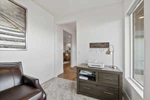 Office or Sitting room featuring baseboards and carpet floors