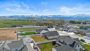 Drone / aerial view with a residential view and a mountain view