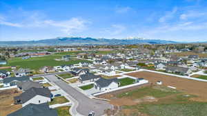 Drone / aerial view with a residential view and a mountain view