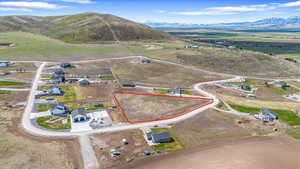 Birds eye view of property with a mountain view