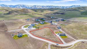 Birds eye view of property with a mountain view