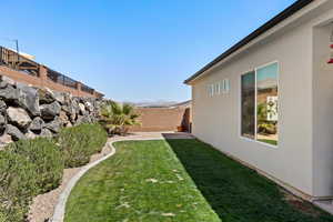View of yard with a fenced backyard