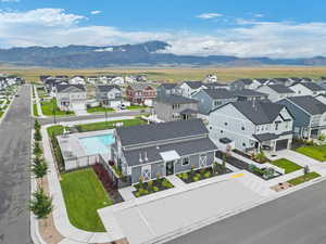 Drone / aerial view featuring a mountain view and a residential view