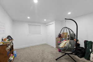Rec room with recessed lighting, carpet flooring, and baseboards
