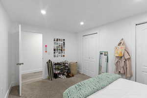 Bedroom featuring recessed lighting, carpet floors, and baseboards