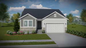 View of front facade featuring concrete driveway, a front lawn, stone siding, and an attached garage