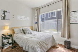 Bedroom featuring baseboards