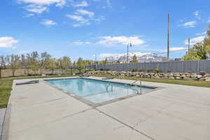 View of swimming pool with a fenced backyard, a patio, and a fenced in pool