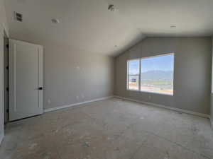 Owner's Suite featuring lofted ceiling and a mountain view