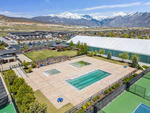 HOA Pools - Drone / aerial view featuring a mountain view