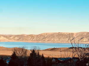 Property view of water featuring a mountain view