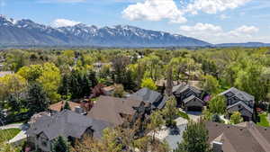 Drone / aerial view with a residential view and a mountain view