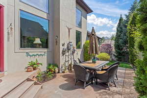 View of patio featuring outdoor dining area