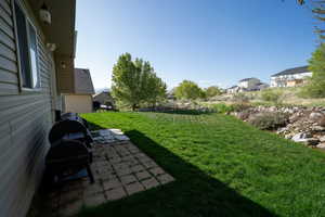 View of yard featuring a patio area