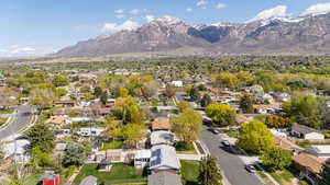 Drone / aerial view with a residential view and a mountain view