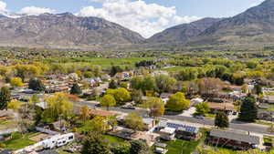 Birds eye view of property featuring a residential view and a mountain view