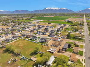 Drone / aerial view with a residential view and a mountain view