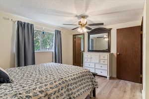 Primary bedroom with access to half bath.