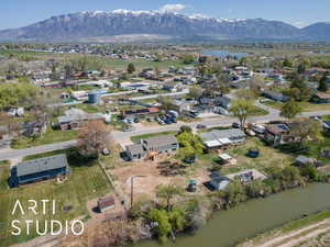 Aerial view featuring a residential view and a water and mountain view