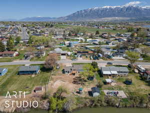 Bird's eye view with a water and mountain view and a residential view