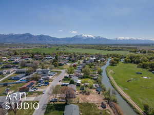 Bird's eye view with a water and mountain view and a residential view