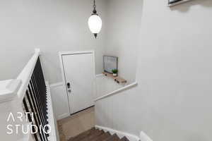 Staircase with wood finished floors