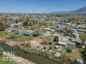 Bird's eye view with a residential view and a water and mountain view