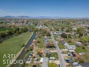 Aerial view featuring a residential view and a water and mountain view