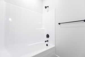 Full bathroom featuring shower / bathtub combination