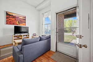 Living room featuring wood finished floors