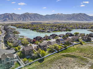 Aerial view with a water and mountain view and a residential view