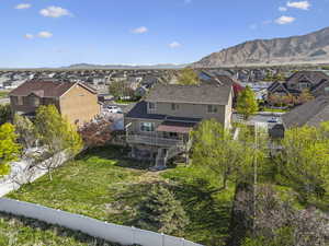 Birds eye view of property featuring a mountain view and a residential view