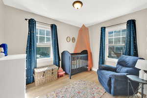 Bedroom featuring wood finished floors