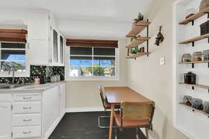 Dining area featuring baseboards