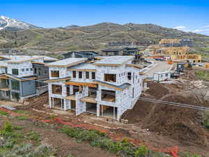 Rear view of house with a mountain view