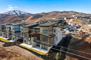 Mountain view featuring nearby suburban area