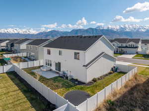 Birds eye view of property with a residential view and a mountain view