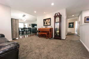 View looking from formal front room to dinning and family room.