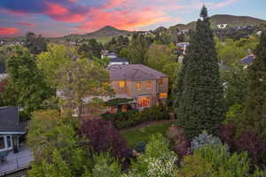 Aerial view at dusk with a mountain view