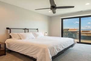 Bedroom featuring carpet, recessed lighting, and access to exterior