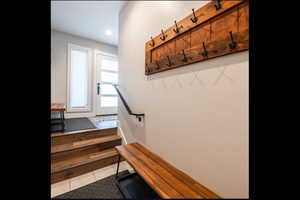 Mudroom featuring recessed lighting and tile patterned flooring
