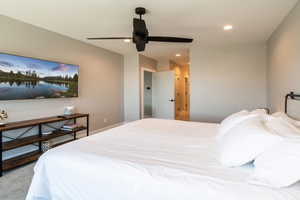 Bedroom with a ceiling fan, carpet flooring, and recessed lighting