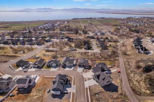 Drone / aerial view featuring a water view and a residential view