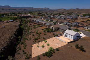 Drone / aerial view with a residential view and a mountain view